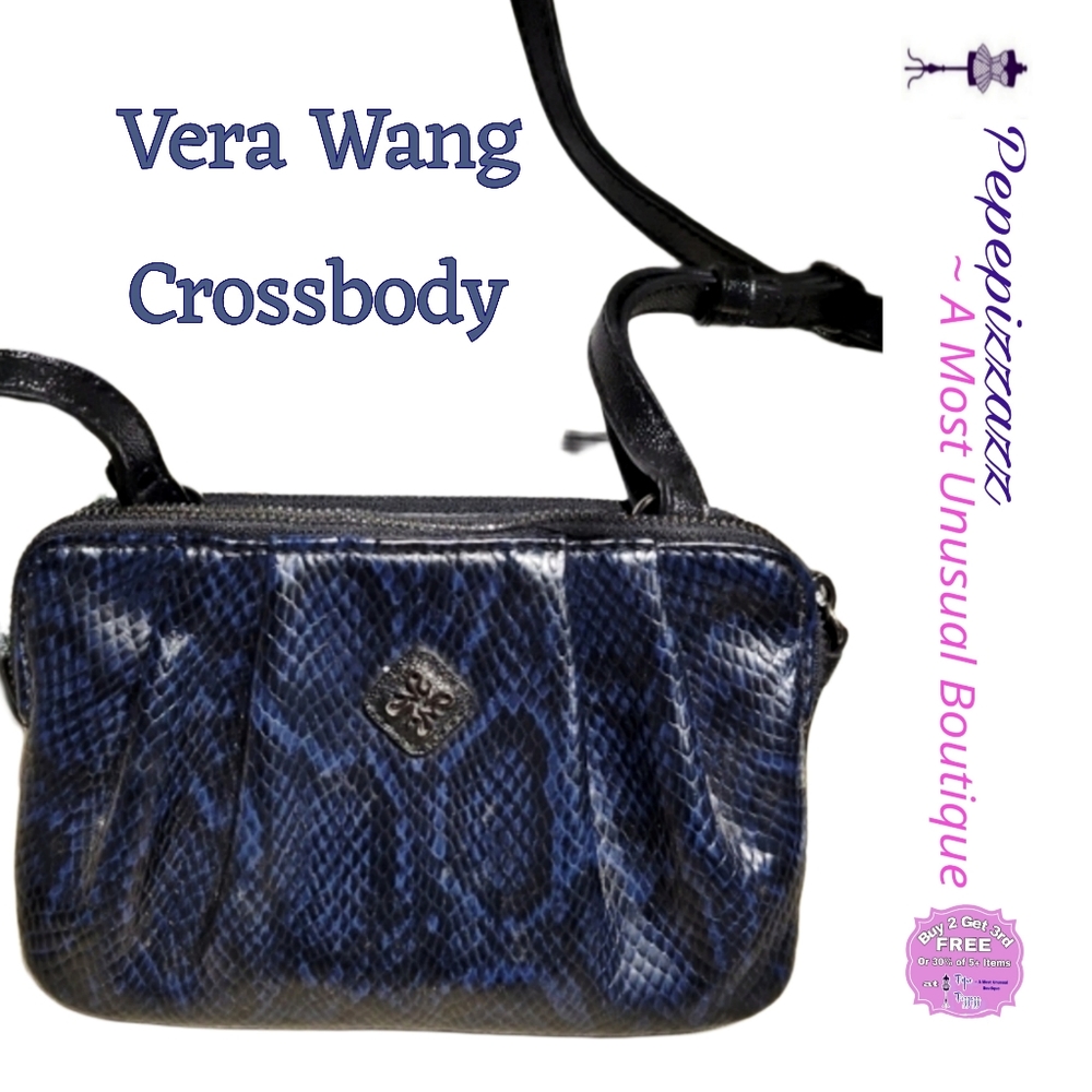 Vera Wang crossbody bag blue animal print. 3 compartments. Organizer